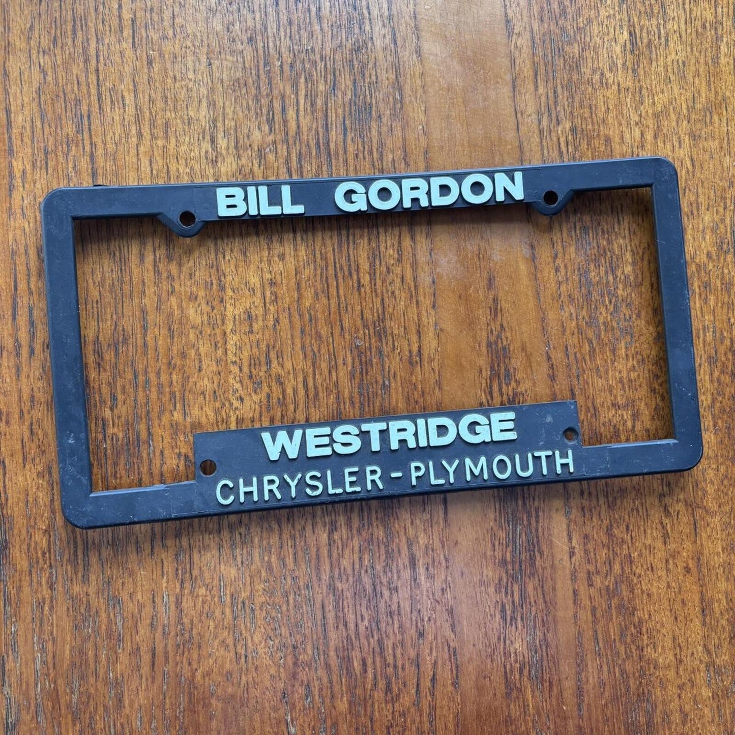 Vintage 90s USA Chrysler car dealership Rochester American license plate holder