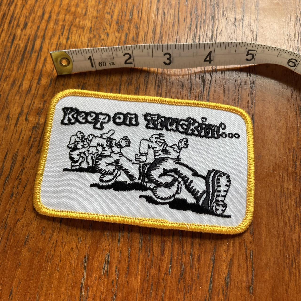 Vintage 80s USA Robert crumb cartoon “keep on truckin” embroidered sew on badge