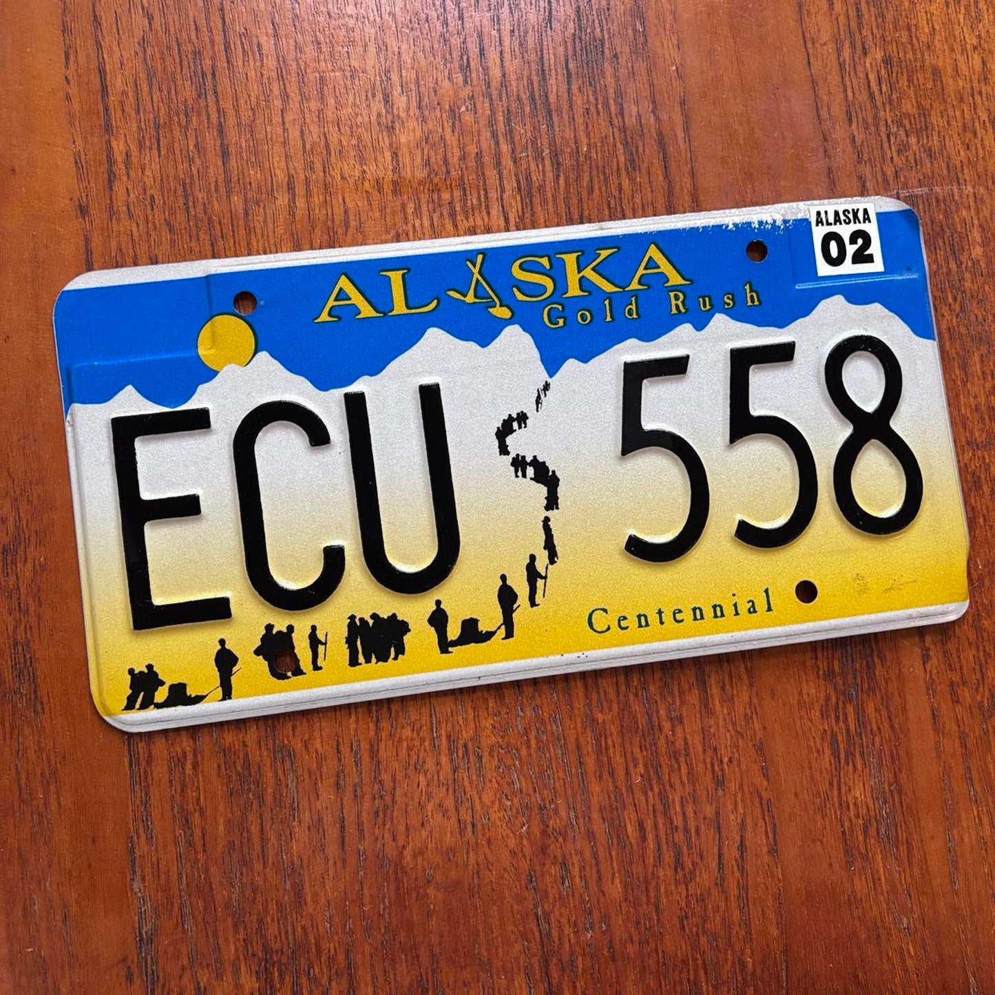 Vintage Y2K USA Alaska State gold rush centennial American license plate