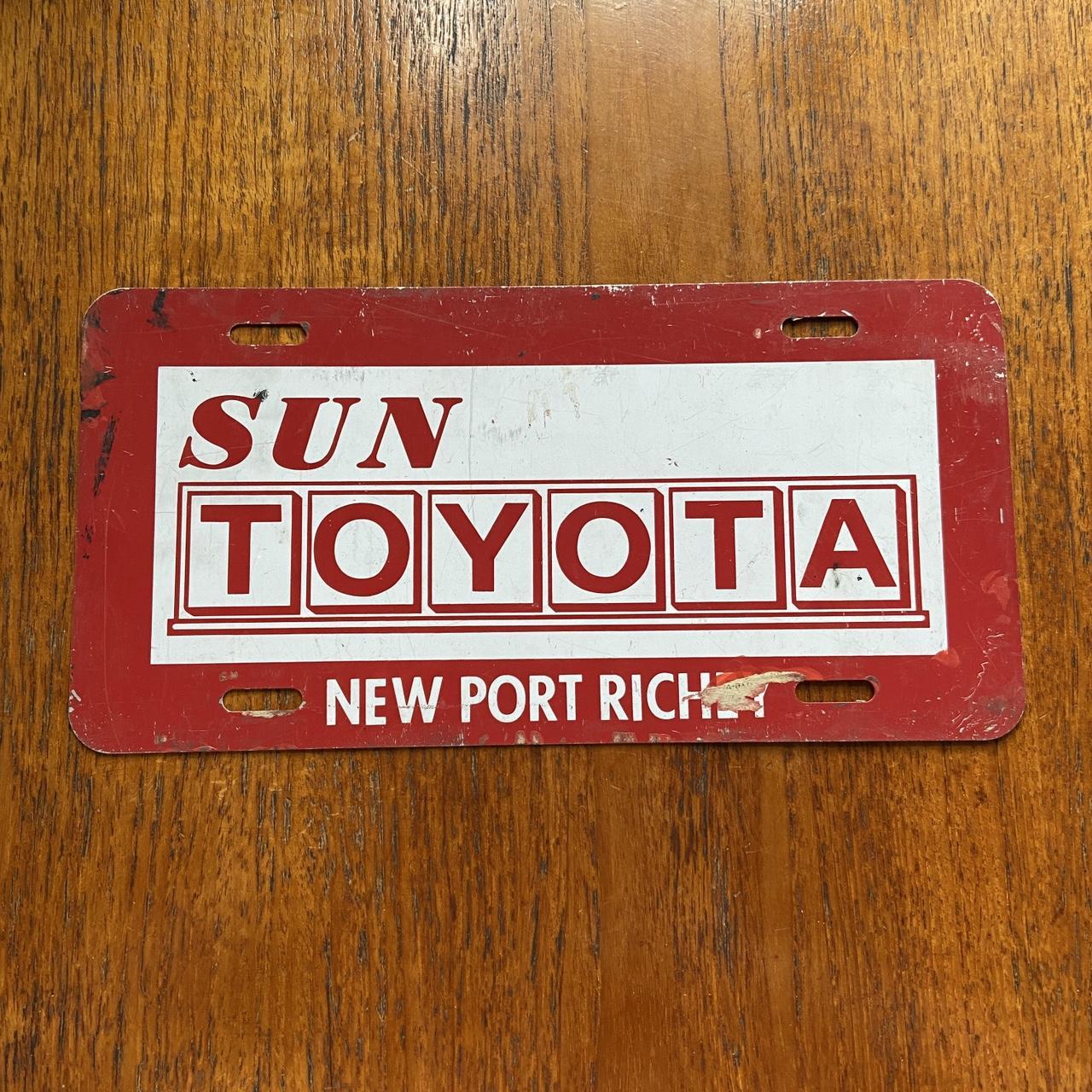 Vintage 90s USA Sun Toyota New Port Richey Florida automobile garage American license plate