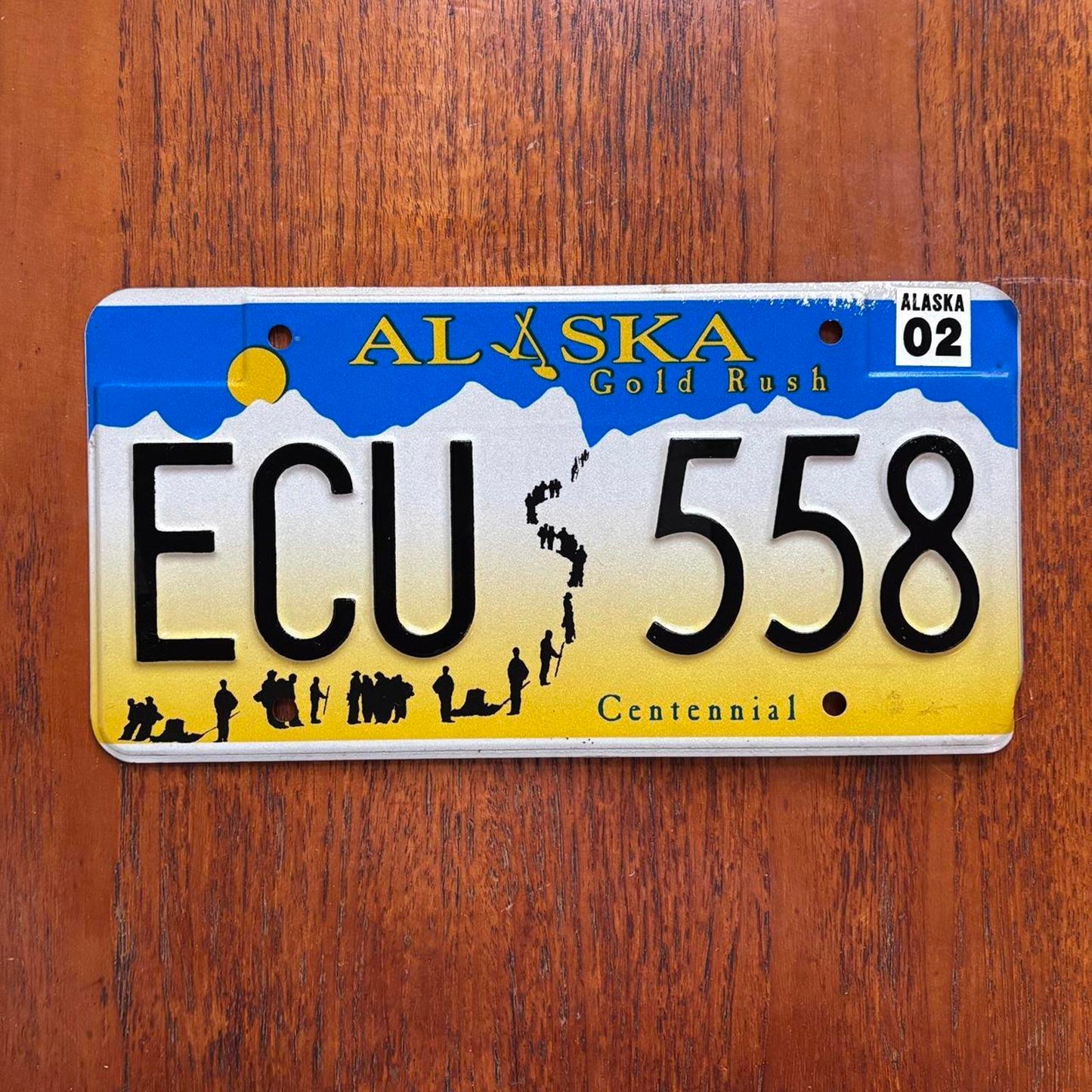 Vintage Y2K USA Alaska State gold rush centennial American license plate