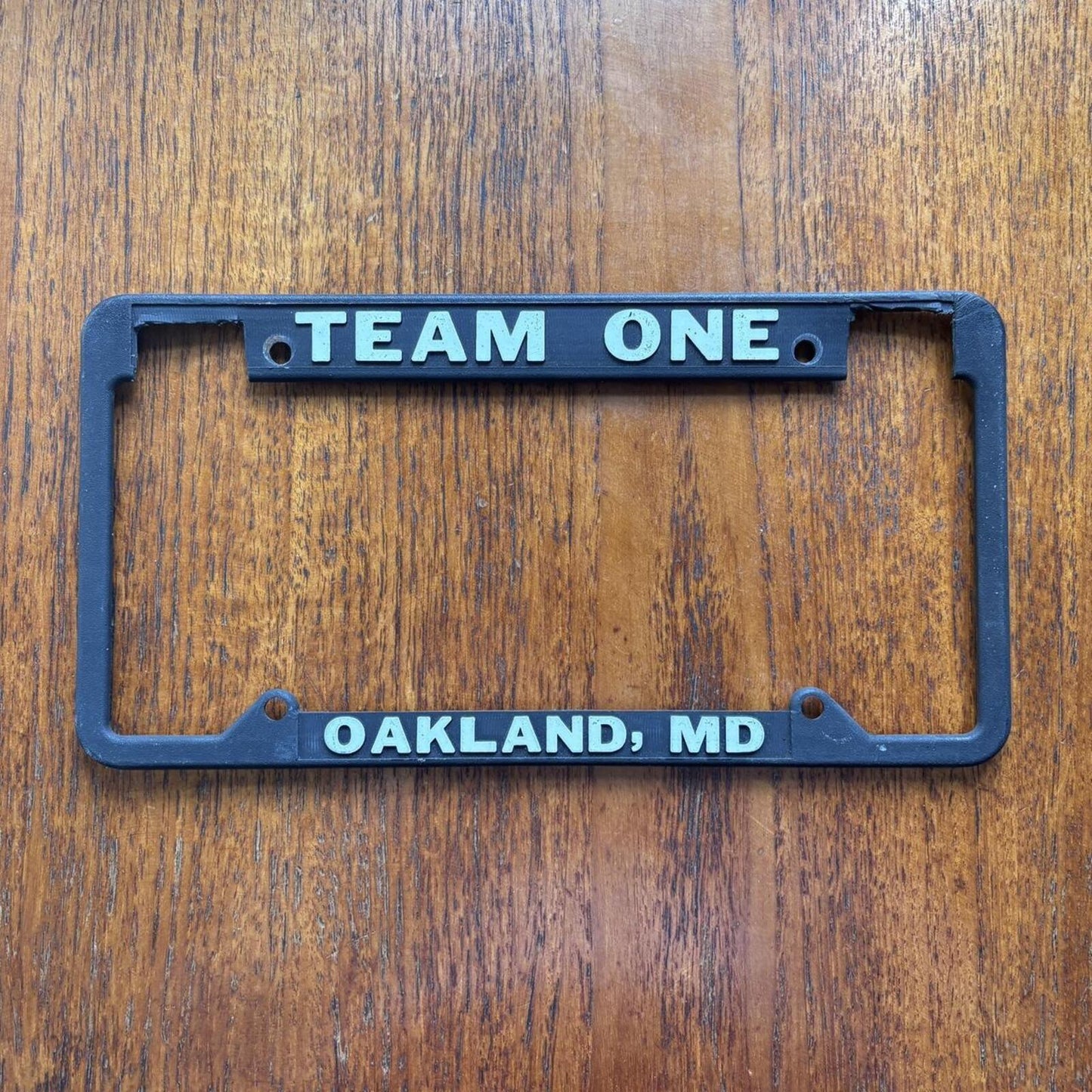 Vintage 90s USA car dealership Maryland American license plate holder