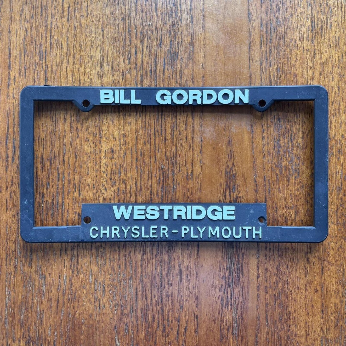 Vintage 90s USA Chrysler car dealership Rochester American license plate holder