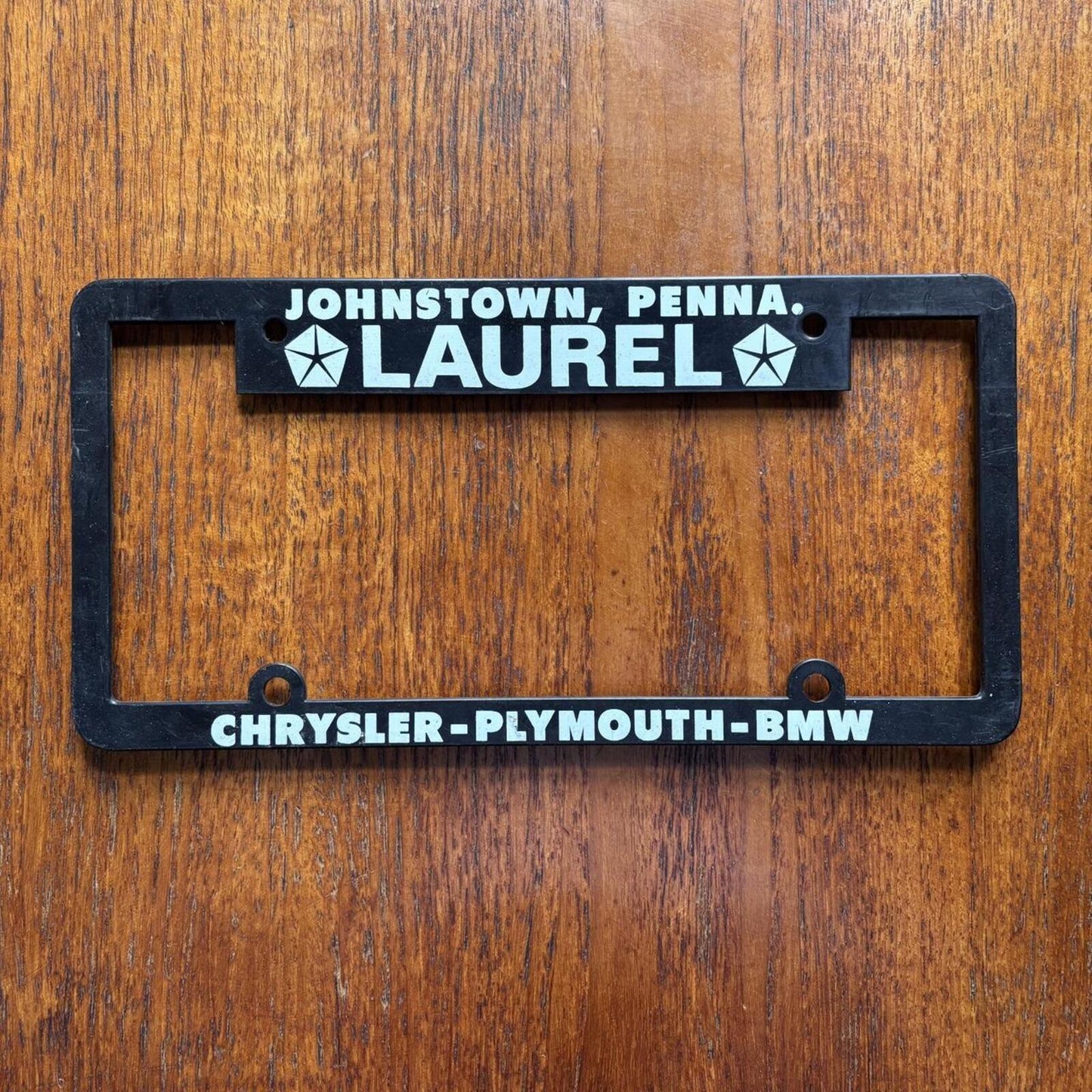 Vintage 90s Laurel Chrysler BMW car dealership American license plate holder