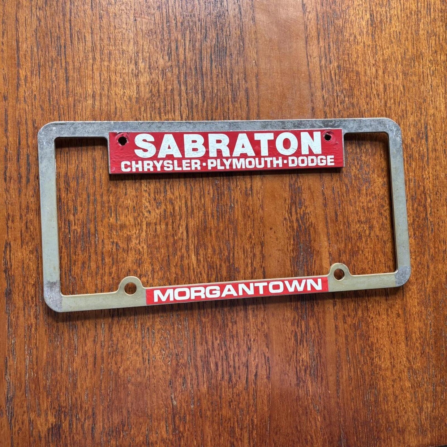 Vintage 90s Chrysler Dodge dealership West Virginia America license plate holder
