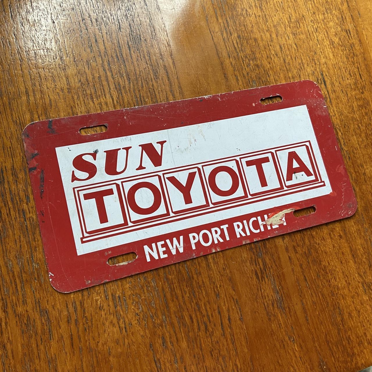 Vintage 90s USA Sun Toyota New Port Richey Florida automobile garage American license plate