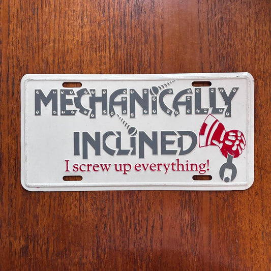 Vintage 90s USA Mechanically Inclined humour novelty license plate